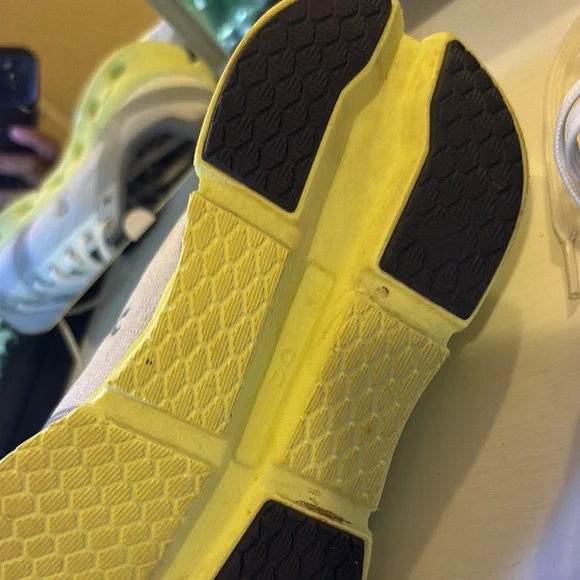 On Running Light Gray and Soft Yellow Shoes